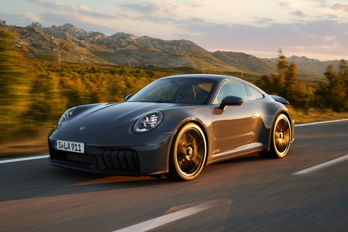 Porsche 911 adopts hybrid, steers clear of full electrification